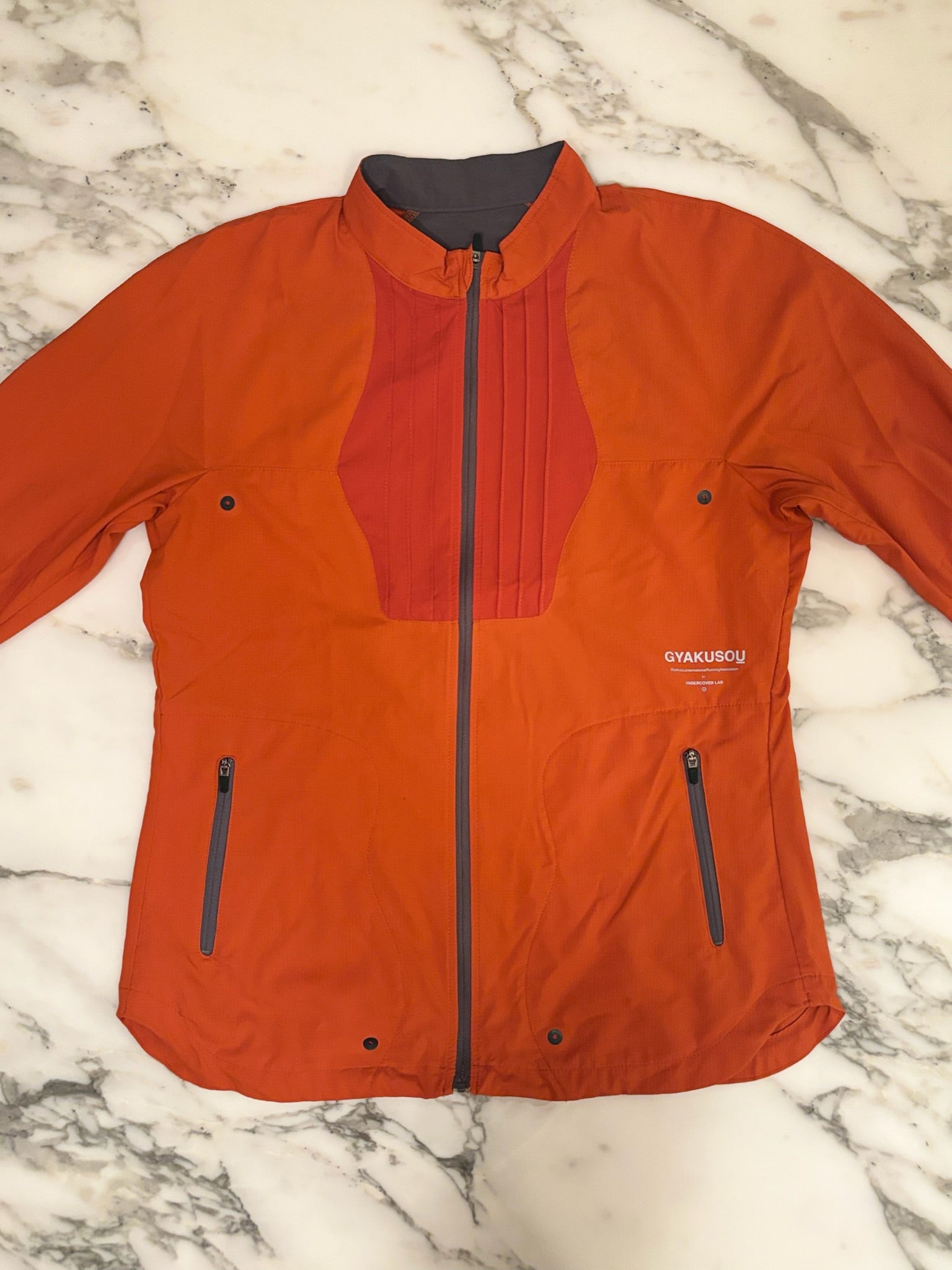 Gyakusou Orange Running Top